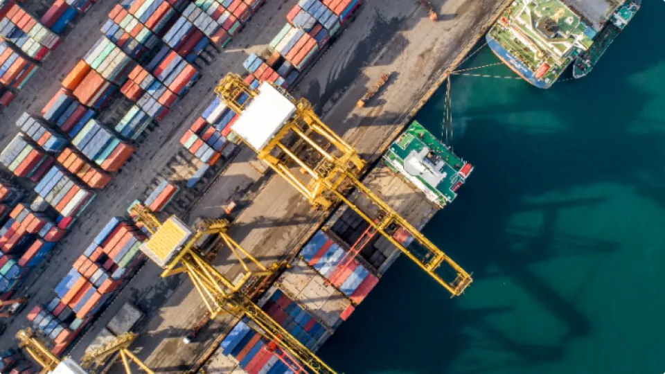 containers being loaded on a containership