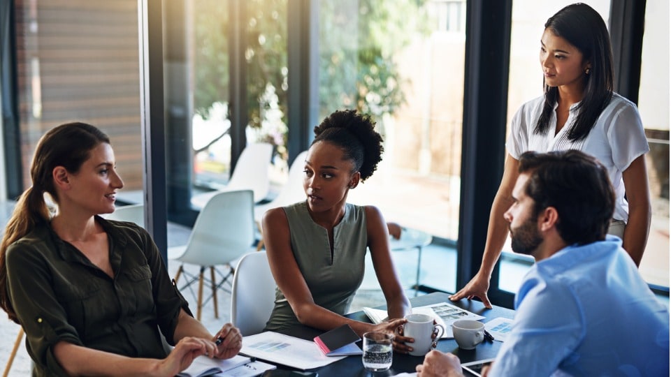 businesspeople having a meeting in a boardroom